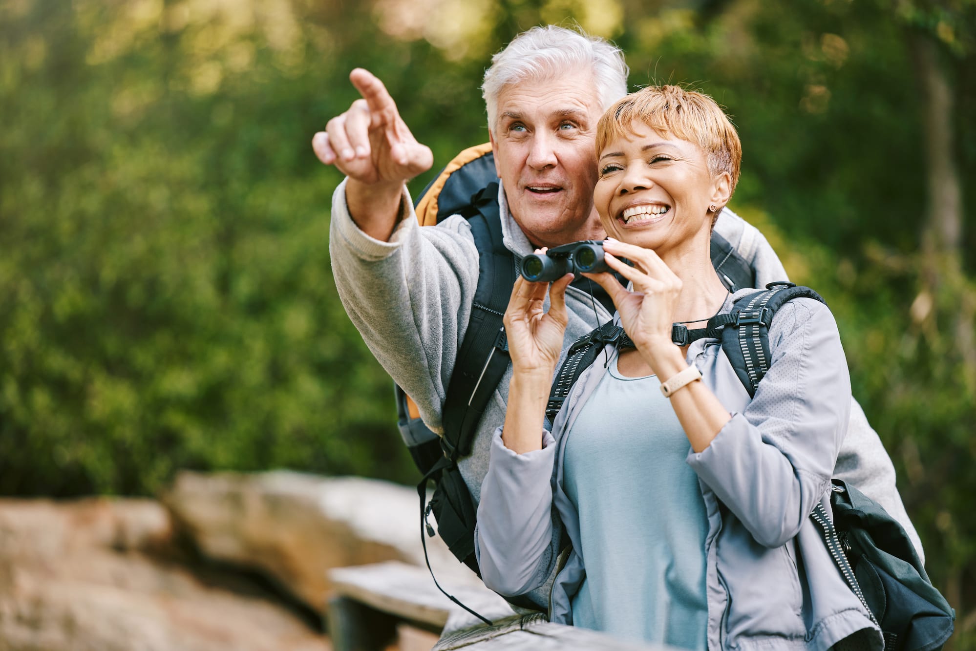 Picture of a senior couple bird watching