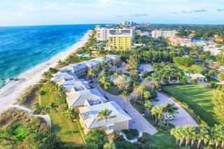 Image of condominiums on the beach in Naples, Florida overlooking the Gulf of Mexico