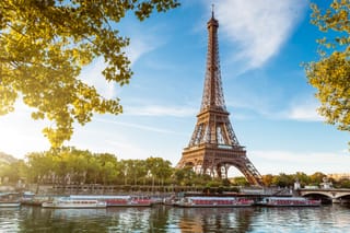 Picture of senior citizens visiting Paris France at the Eiffel Tower