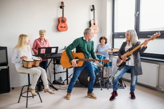 Picture of a group of seniors playing music together