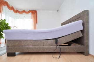 Image of an adjustable bed and control