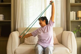 Photo of a women using a resistance band 