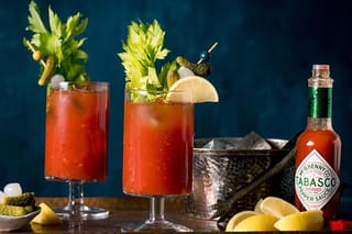 Image of a bottle of Tabasco pepper sauce and bloody mary drinks