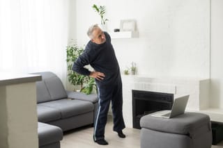 Picture of a senior man doing a simple home workout 