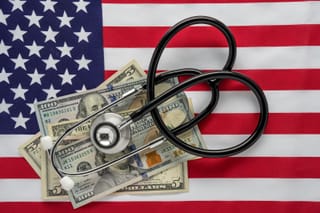 Picture of an American flag with a stethoscope and cash