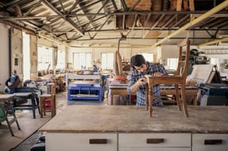 Photo of a man in a furniture factory 
