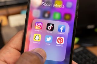 Picture of a smart phone showing social media apps icons