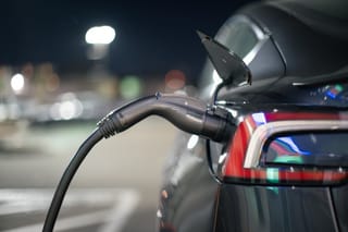 Photo of an electric car charging close up 