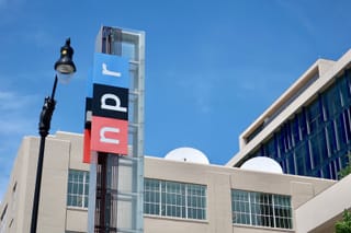 Picture of NPR headquarters and sign in Washington DC 