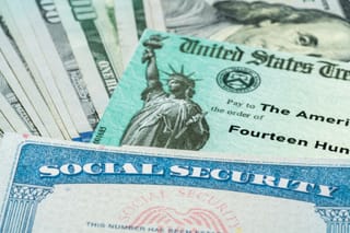 Picture of a social security card, US Treasury check, and hundred dollar bill