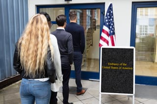 Photo of students waiting in line at a U.S. embassy 