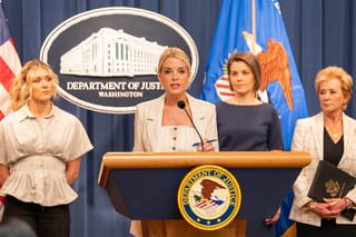 Picture of Pam Bondi at a press conference 