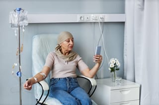 Picture of a senior woman getting chemotherapy 
