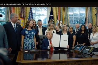Picture of President Donald Trump signing a proclamation commemorating fallen soldiers at Abbey Gate