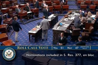 Picture of the U.S. Senate floor and roll call vote count of 51 yea to 47 nay