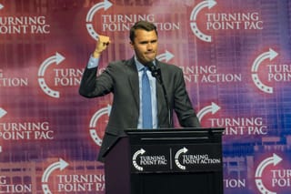 Picture of Charlie Kirk of Turning Point USA speaking at a lectern