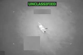 Picture of a drug running boat just before it is destroyed