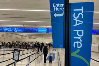 Picture of a TSA Pre sign at an airport