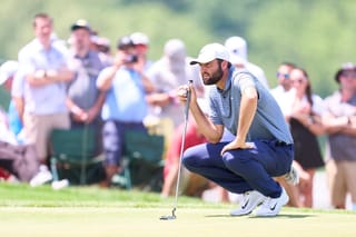 Image of Scottie Scheffler on a golf course 