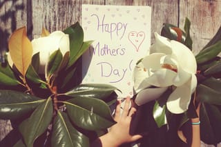 Image of flowers and a note that says Happy Mother's Day