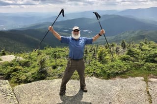 A picture of Dale "Grey Beard" Sanders on a trail 