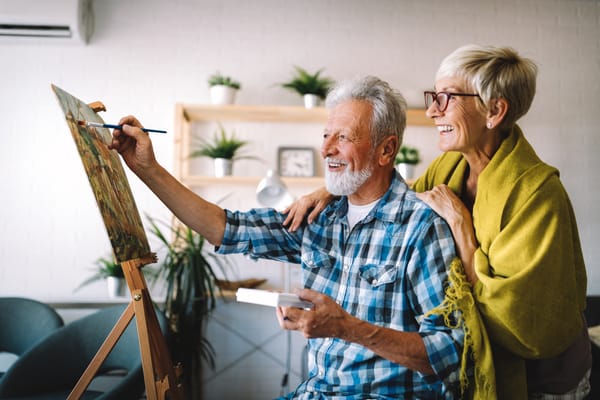 Retired couple painting