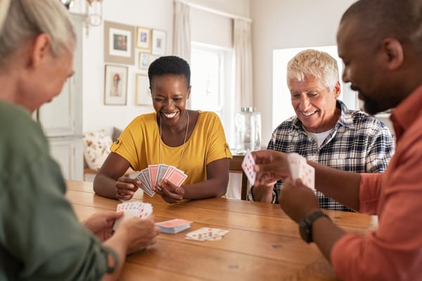 Picture of two couples playing bridge