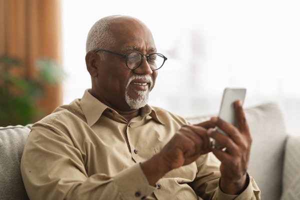 Picture of a senior man with a smart phone