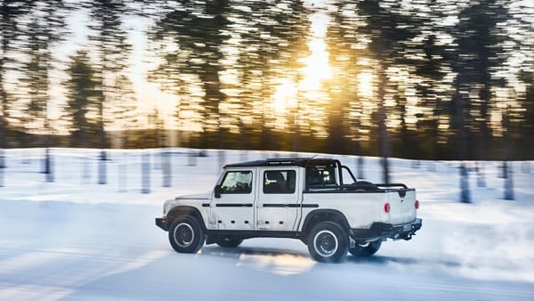 Picture of the Ineos Grenadier truck driving down a snow covered road 