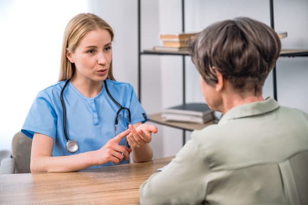 Image of a doctor consulting a senior patient regarding Medicare Advantage Options