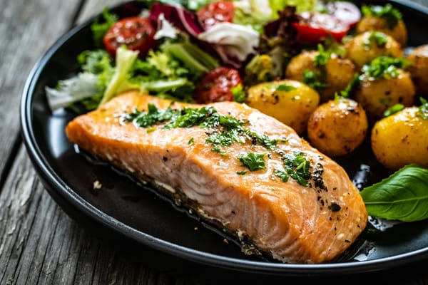 Image of a fresh roasted salmon and vegetable dinner