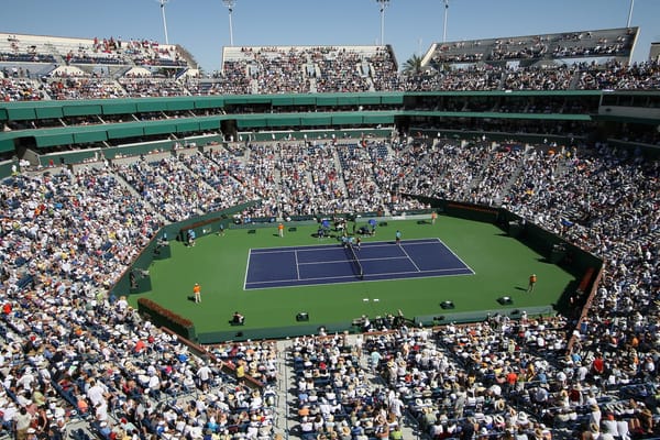 Image of a tennis stadium full of fans