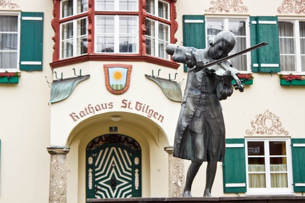 Image of a status of Wolfgang Amadeus Mozart in front of Rathaus St Gilgen in Austria