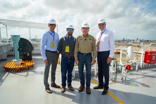 Photo of Doug Burgum at an lng facility 