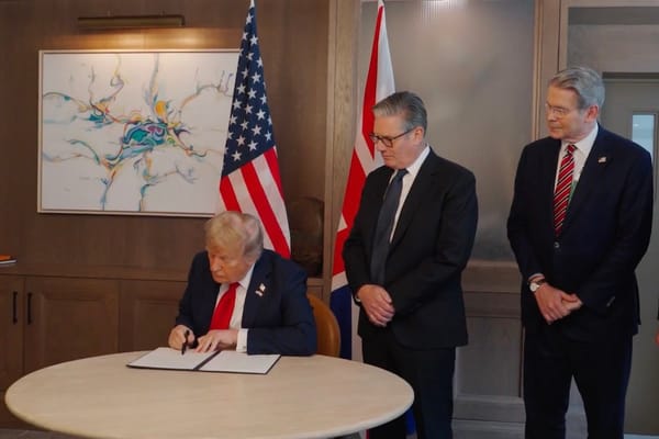 Picture of President Donald Trump and Prime Minister Keir Starmer signing U.S. - U.K. Trade Pact