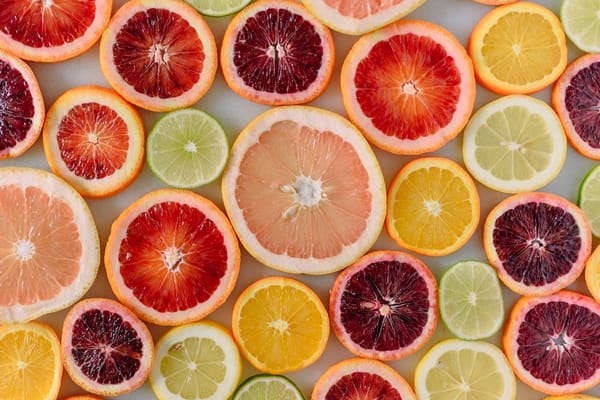 Picture of various citrus fruits including blood oranges, grapefruits, lemons, limes, and mandarins