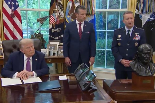 Picture of President Trump signing a declaration to rename Department of Defense to Department of War