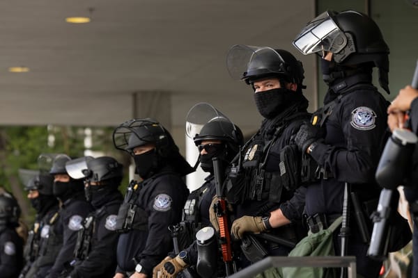Picture of several ICE officers in a line
