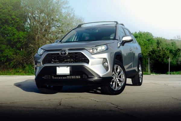 Image of a silver Toyota Rav 4.